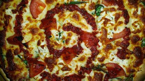 Santos pizza - santos signature pizzas. any signature pizza can be on sicilian, grandmas sicilian or round deep dish with additional $3.95 italian special 12'' prosciutto, capicola, mushrooms, artichokes, black olives, fresh basil, and fresh mozzarella. italian special 16'' $21.95. 15.95.